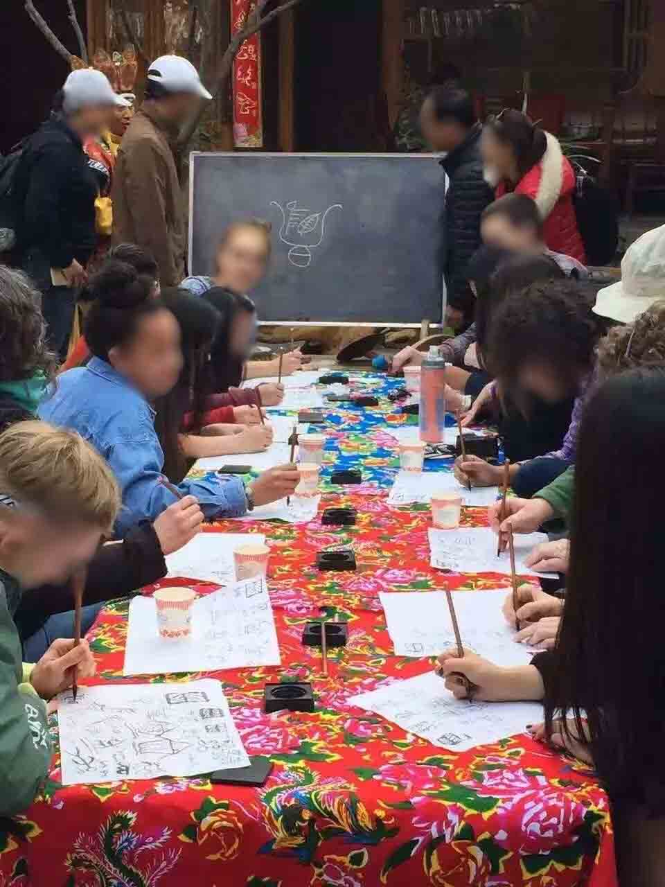 Dongba pictographic writing session